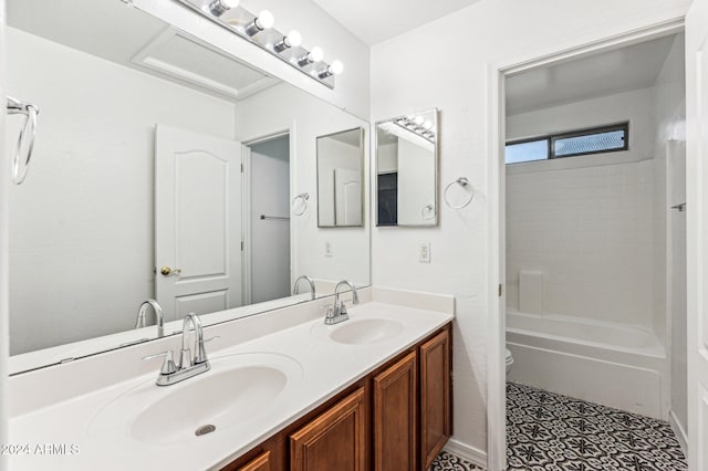 full bathroom featuring vanity,  shower combination, and toilet