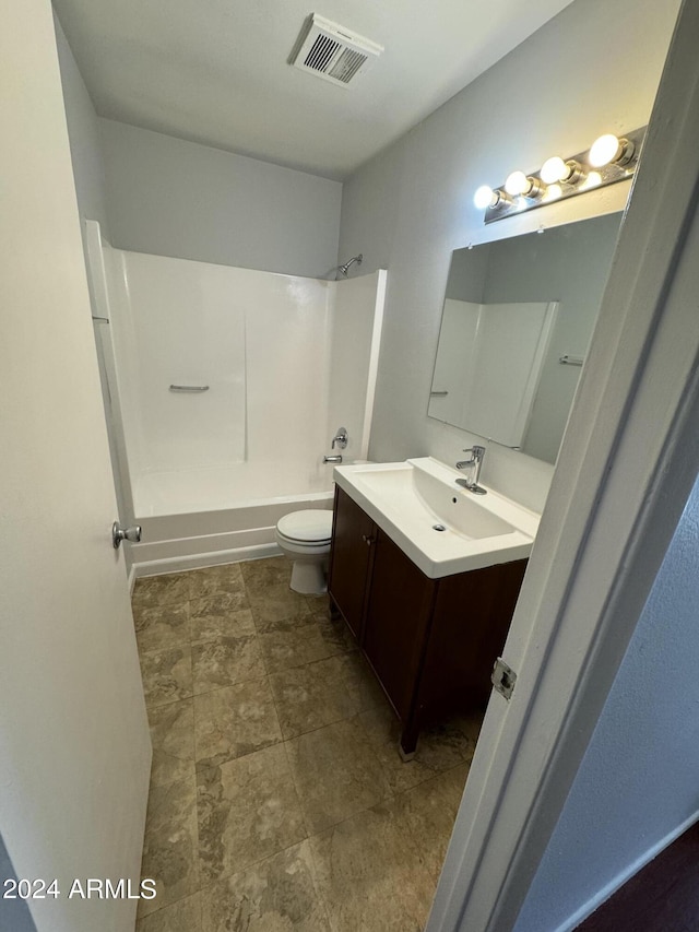 full bathroom with vanity, toilet, and shower / bathtub combination