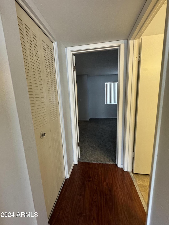 hallway featuring hardwood / wood-style floors