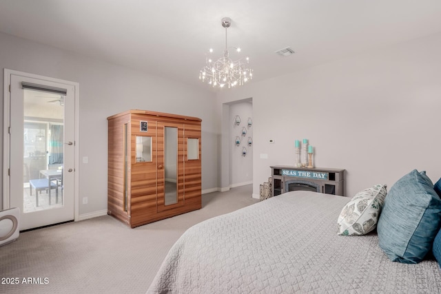 bedroom featuring visible vents, baseboards, access to outside, carpet, and a notable chandelier