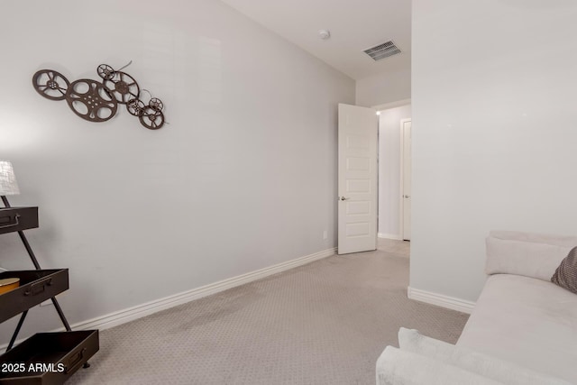 living area with baseboards, carpet, and visible vents