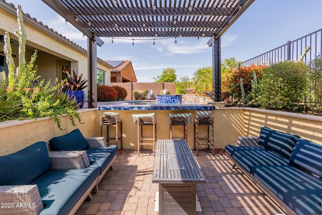 view of patio / terrace featuring a fenced backyard, outdoor dry bar, a pergola, and outdoor lounge area