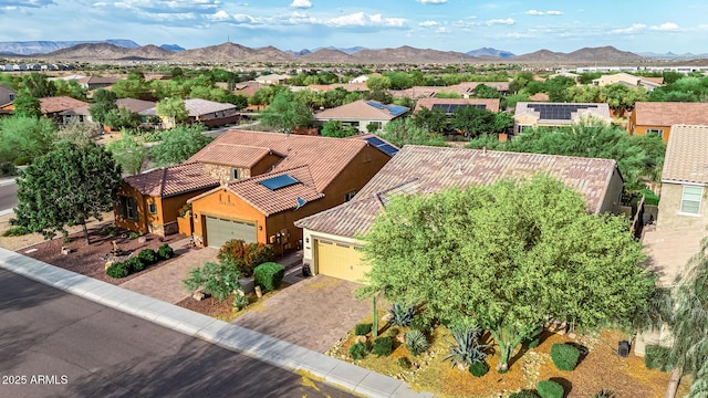 birds eye view of property with a residential view and a mountain view