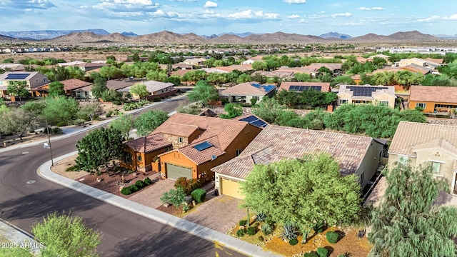 drone / aerial view featuring a mountain view and a residential view