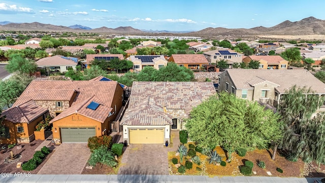 bird's eye view featuring a residential view and a mountain view