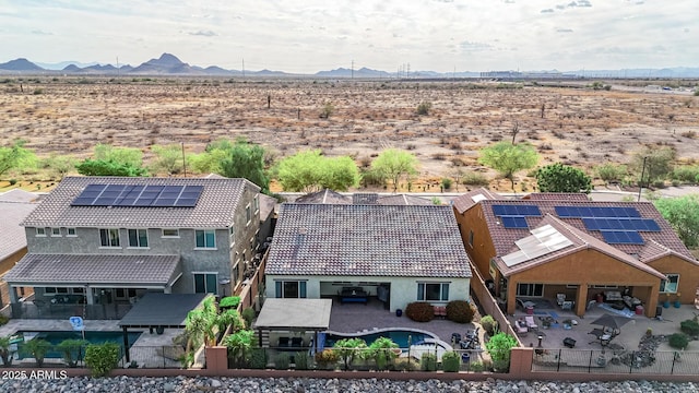 bird's eye view with view of desert and a mountain view