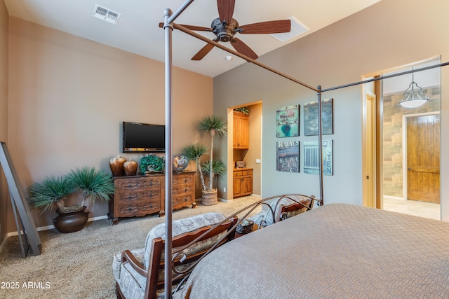 bedroom featuring carpet, connected bathroom, and ceiling fan