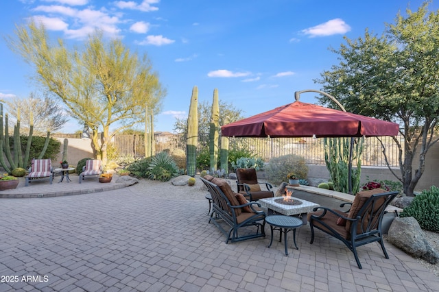 view of patio featuring an outdoor fire pit