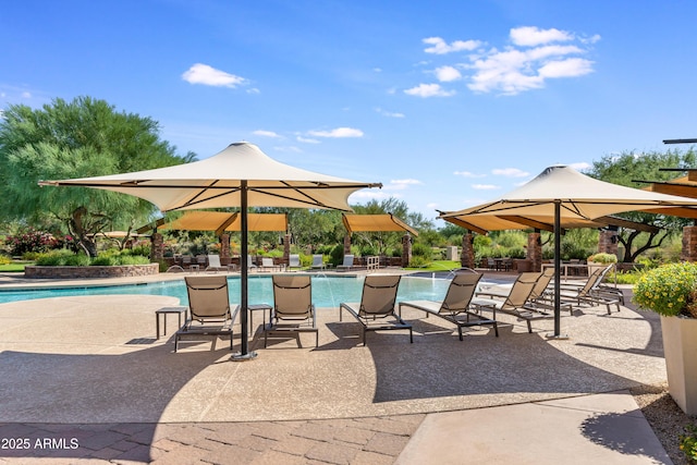 view of patio / terrace featuring a community pool