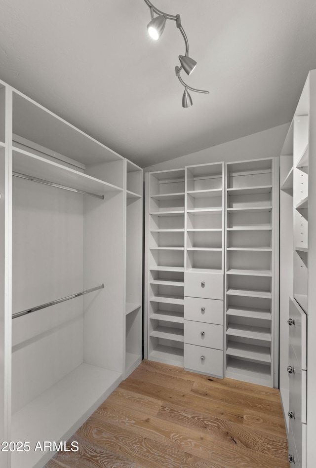 4824 E Hummingbird Ln, Paradise Valley, AZ 85253 - walk in closet featuring light wood finished floors
