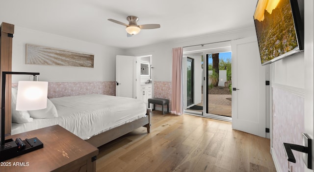 4824 E Hummingbird Ln, Paradise Valley, AZ 85253 - bedroom with access to outside, light wood-type flooring, ornamental molding, a ceiling fan, and connected bathroom