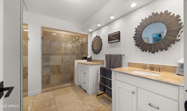 4824 E Hummingbird Ln, Paradise Valley, AZ 85253 - full bathroom featuring recessed lighting, two vanities, and a shower stall