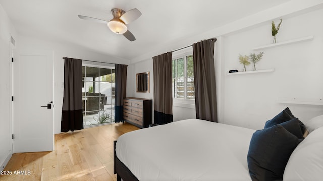 4824 E Hummingbird Ln, Paradise Valley, AZ 85253 - bedroom featuring light wood-style flooring, lofted ceiling, access to outside, and a ceiling fan