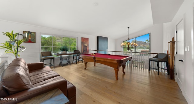 4824 E Hummingbird Ln, Paradise Valley, AZ 85253 - playroom featuring wood finished floors, a chandelier, billiards table, and vaulted ceiling