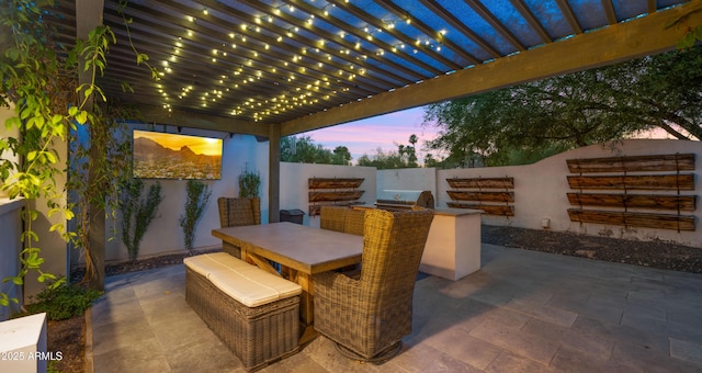 4824 E Hummingbird Ln, Paradise Valley, AZ 85253 - view of patio featuring an outdoor kitchen, outdoor dining space, and a pergola