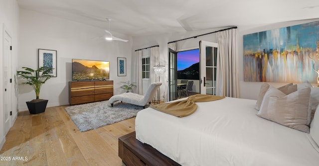 4824 E Hummingbird Ln, Paradise Valley, AZ 85253 - bedroom featuring vaulted ceiling and wood finished floors