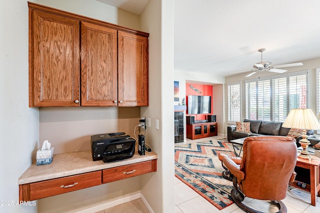 office area featuring ceiling fan and light tile patterned floors