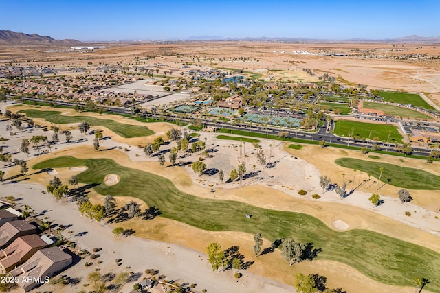 birds eye view of property with a mountain view