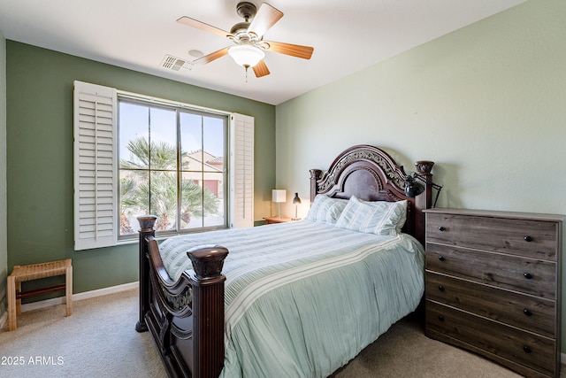 bedroom with ceiling fan and carpet floors