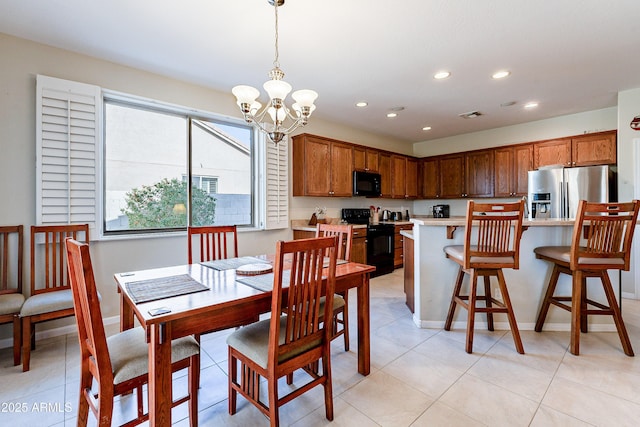 dining room featuring a notable chandelier