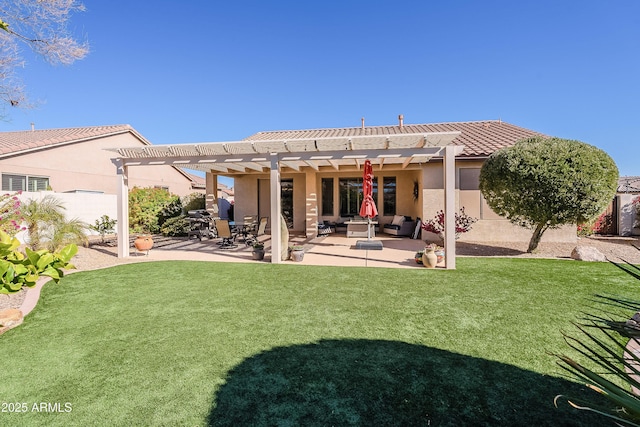 rear view of property featuring a pergola, an outdoor living space, a lawn, and a patio