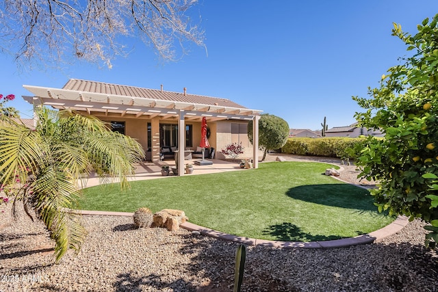 back of property featuring a pergola, a patio area, and a lawn