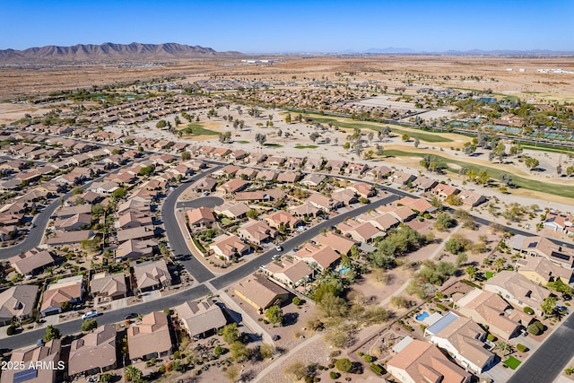 drone / aerial view featuring a mountain view