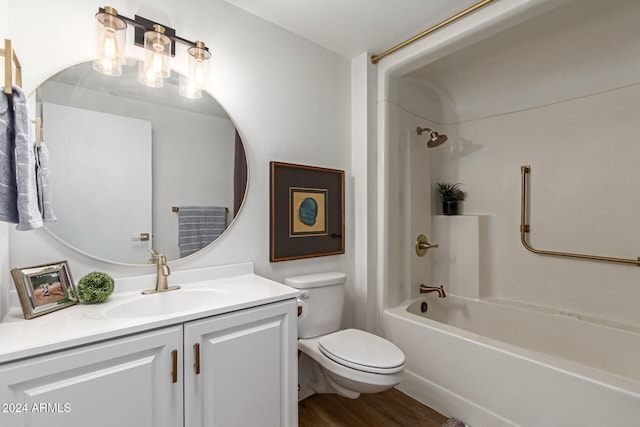 full bathroom with vanity, wood-type flooring, toilet, and tub / shower combination