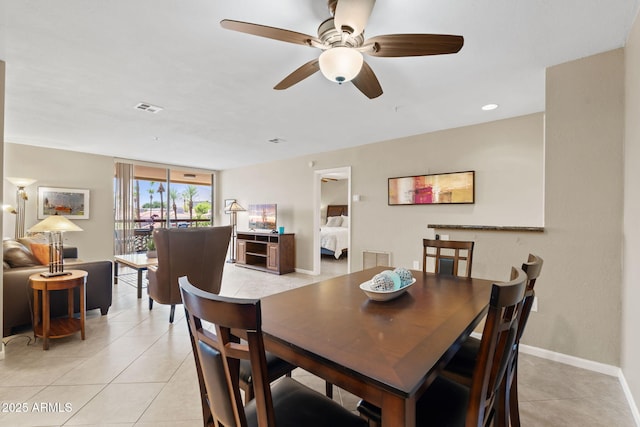 4200 N Miller Rd Unit 408, Scottsdale, AZ 85251 - dining room featuring light tile patterned flooring and a ceiling fan
