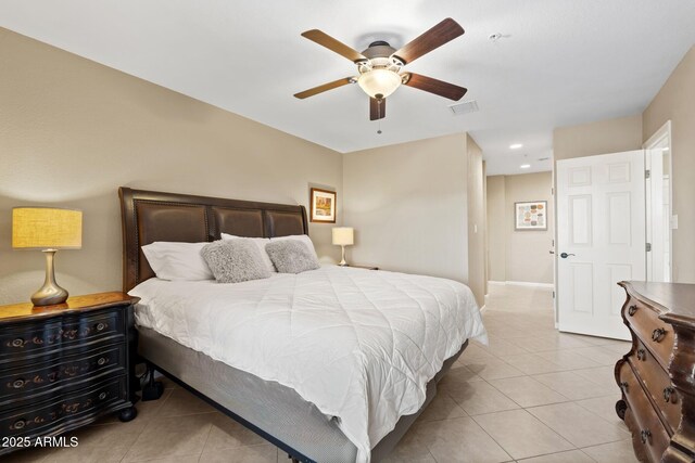 4200 N Miller Rd Unit 408, Scottsdale, AZ 85251 - bedroom featuring light tile patterned flooring, recessed lighting, and a ceiling fan