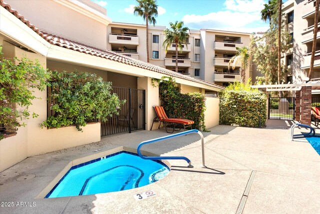 4200 N Miller Rd Unit 408, Scottsdale, AZ 85251 - view of swimming pool with a patio