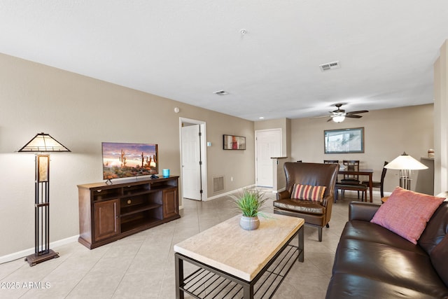 4200 N Miller Rd Unit 408, Scottsdale, AZ 85251 - living area featuring a ceiling fan and light tile patterned flooring