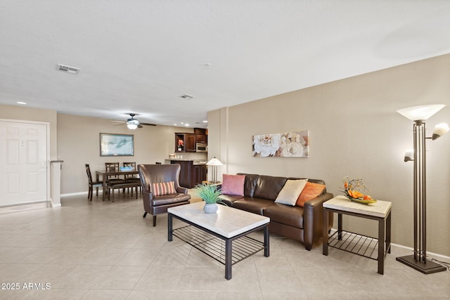4200 N Miller Rd Unit 408, Scottsdale, AZ 85251 - living area with a ceiling fan, light tile patterned floors, and recessed lighting