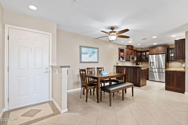 4200 N Miller Rd Unit 408, Scottsdale, AZ 85251 - dining area with a ceiling fan, recessed lighting, and light tile patterned floors