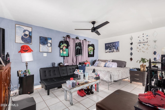 bedroom featuring ceiling fan and light tile patterned flooring