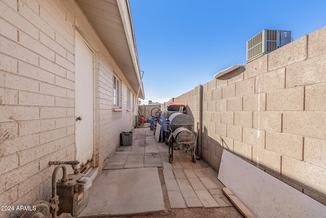 view of side of property featuring a patio area