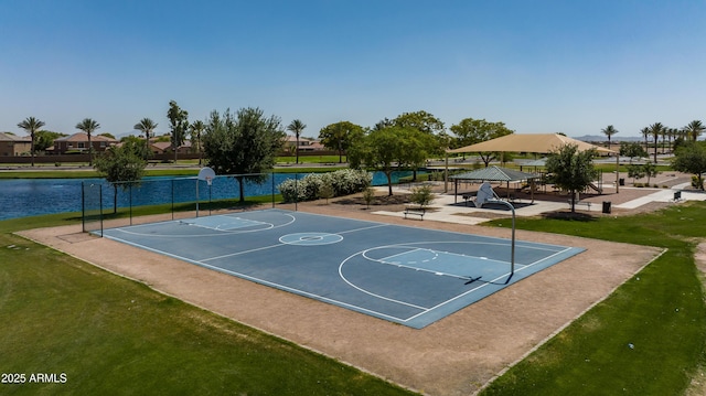 view of basketball court featuring a gazebo, a water view, and a yard