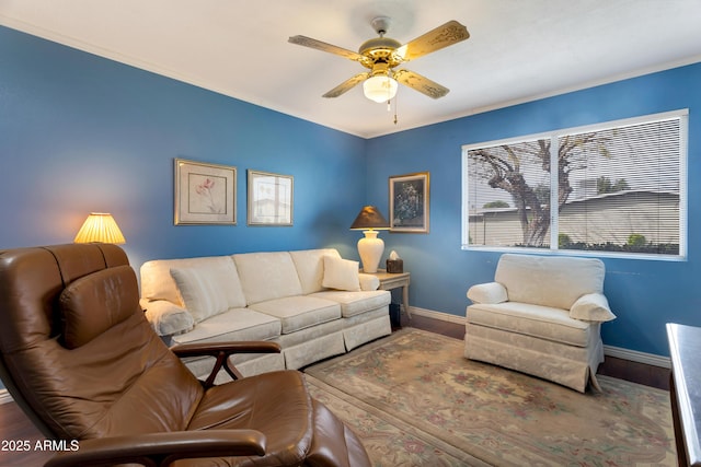 living room featuring ceiling fan and wood-type flooring