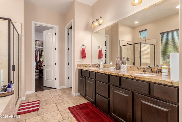 bathroom with vanity and walk in shower