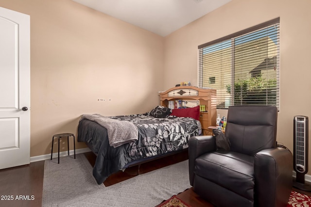 bedroom featuring dark wood-type flooring