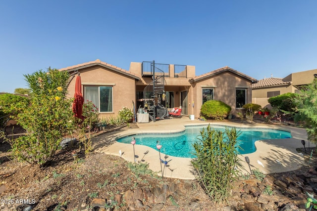 view of pool with a patio area