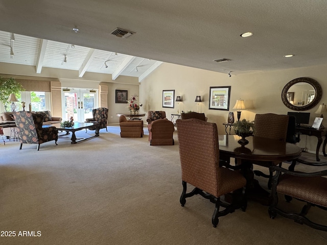 dining room with carpet flooring, vaulted ceiling with beams, recessed lighting, and visible vents