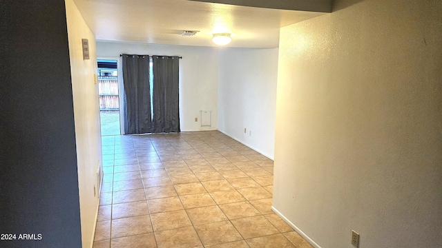 view of tiled spare room