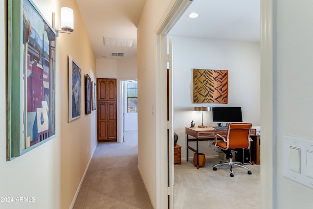 office space with light colored carpet