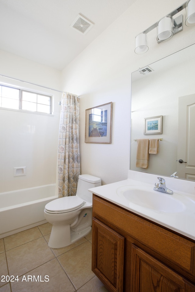 full bathroom with tile patterned flooring, vanity, toilet, and shower / tub combo with curtain