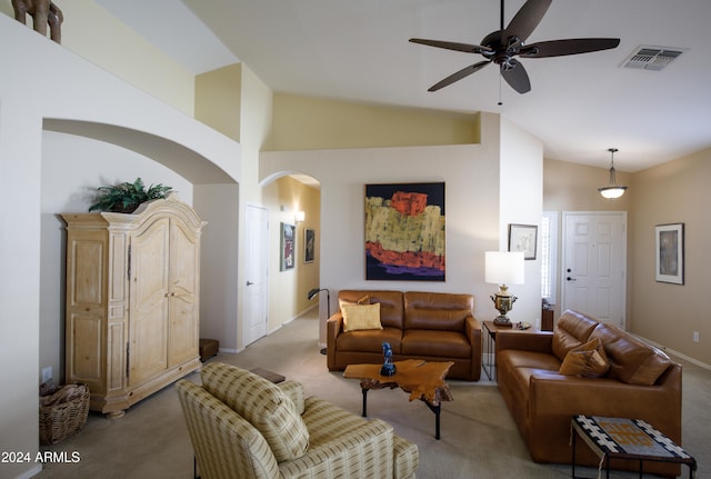 living room with light carpet, ceiling fan, and vaulted ceiling