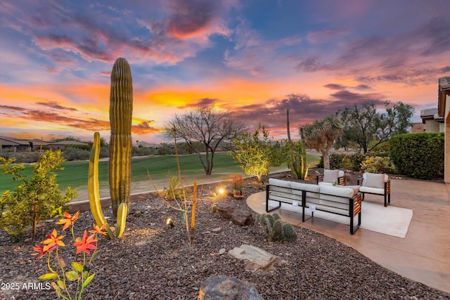 view of community featuring outdoor lounge area and a patio