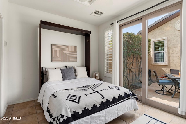 bedroom featuring access to outside, visible vents, baseboards, and light tile patterned flooring