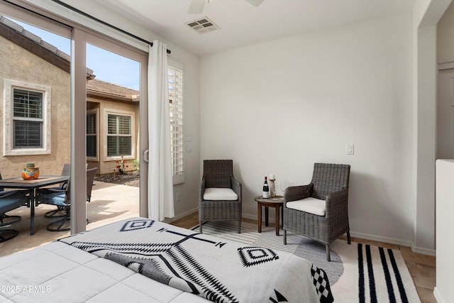 bedroom with visible vents and baseboards