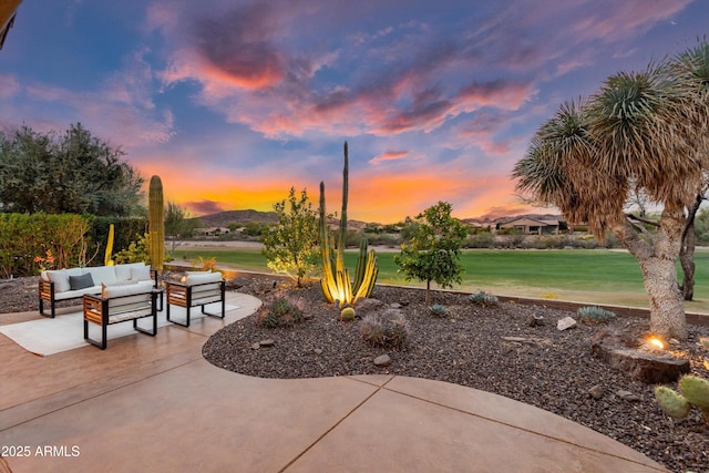 surrounding community with a patio, a lawn, and an outdoor hangout area